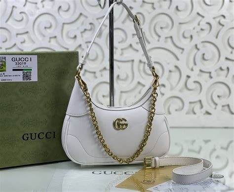 Сумки и рюкзаки женские Gucci на OZON